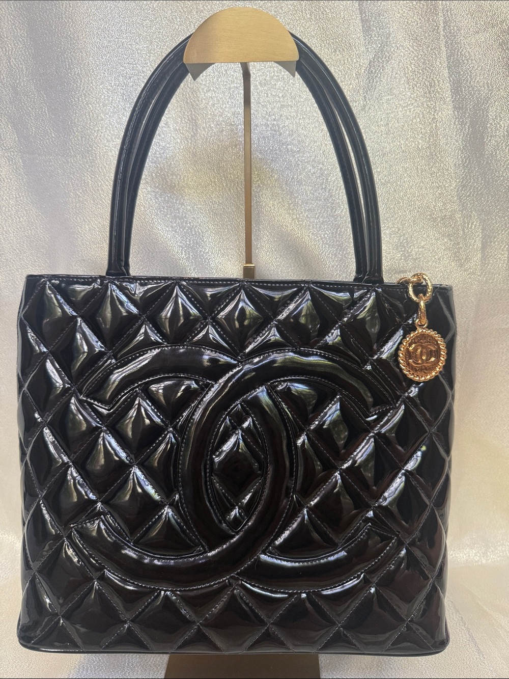 CHANEL Black Quilted Patent Leather Medallion Tote with Gold CC Medallion Charm
